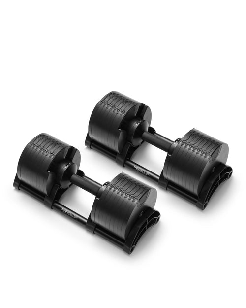 NÜOBELL 580 Black adjustable dumbbell, sleek black design with multiple weight settings, ideal for space-saving home gym strength training.