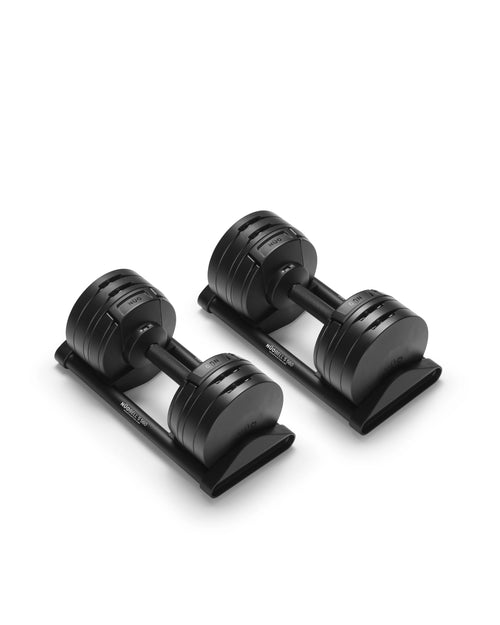 NÜOBELL S 560 Black adjustable dumbbell featuring a sleek matte finish, designed for efficient weight changes and powerful home strength training.