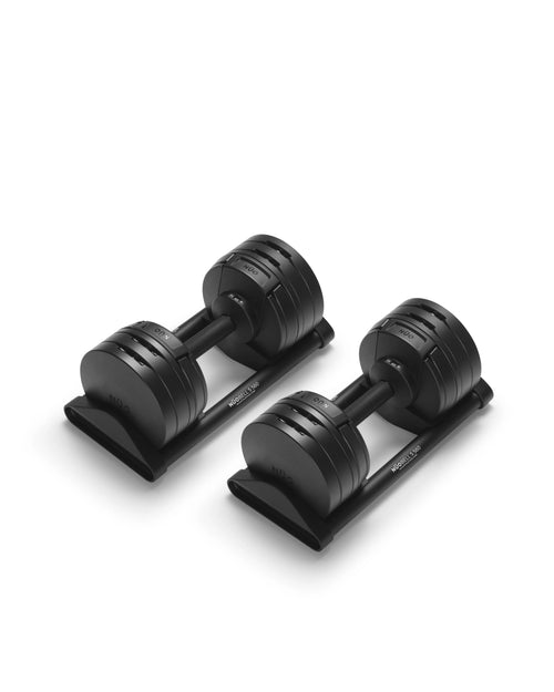 NÜOBELL S 560 Black adjustable dumbbell featuring a sleek matte finish, designed for efficient weight changes and powerful home strength training.
