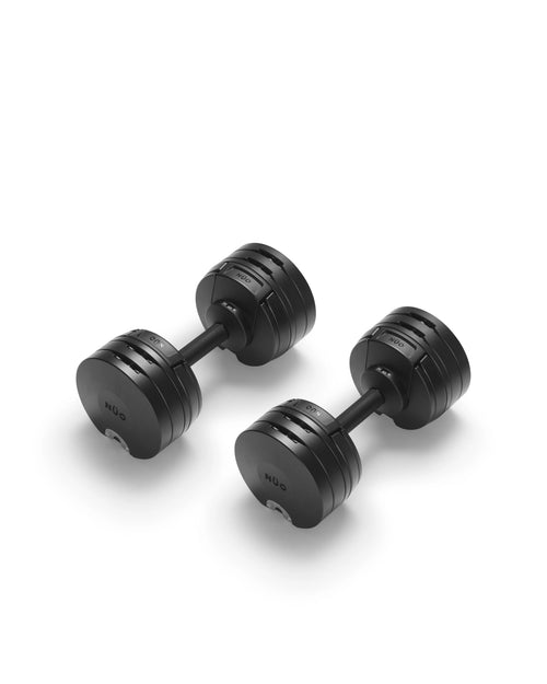 NÜOBELL S 560 Black adjustable dumbbell featuring a sleek matte finish, designed for efficient weight changes and powerful home strength training.