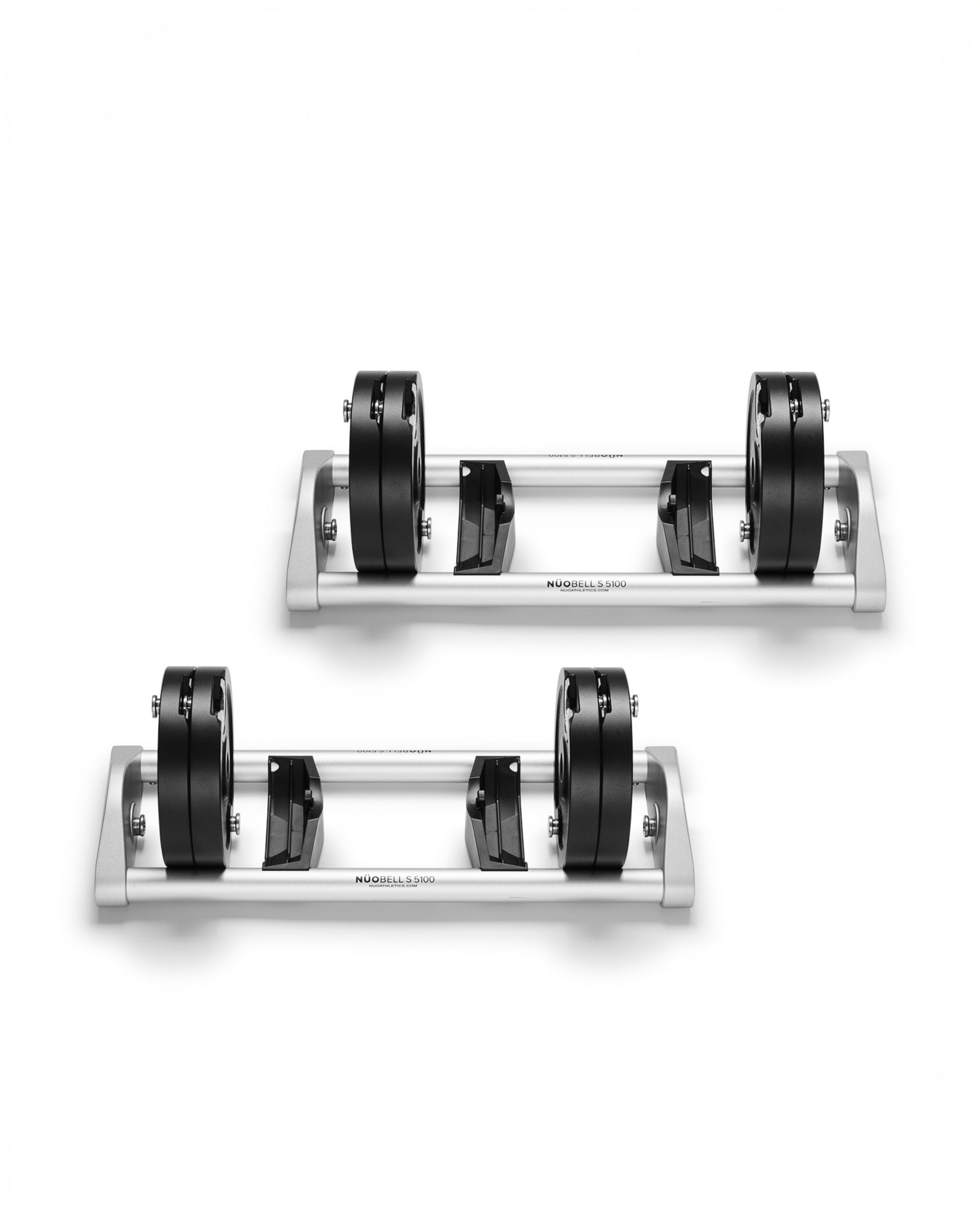 Pair of NÜOBELL S Expansion Kit Silver plates for adjustable dumbbells, ideal for expanding your home gym’s weight range with a sleek, metallic finish.