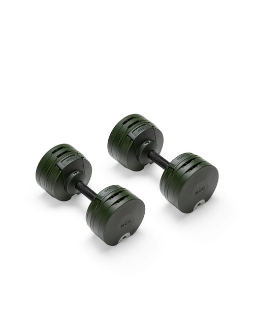 NÜOBELL S 560 Forest adjustable dumbbell in a unique forest green color, offering advanced weight options for home gyms and versatile strength training.